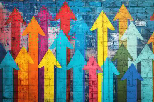 Colorful upward arrows against a textured wall symbolize growth, direction, and positive progress in a vibrant urban setting photo