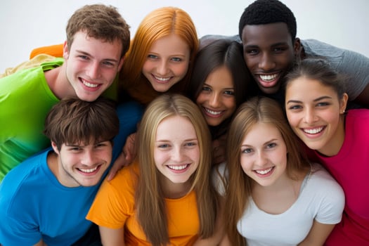 A joyful gathering of diverse friends enjoying time together indoors at a social event, creating lasting memories during a sunny afternoon photo