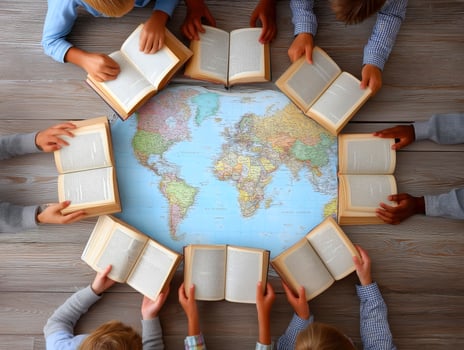 Children reading books around a world map promoting education. photo