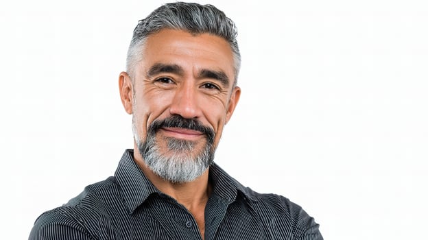 A man with a gray beard and a gray shirt photo
