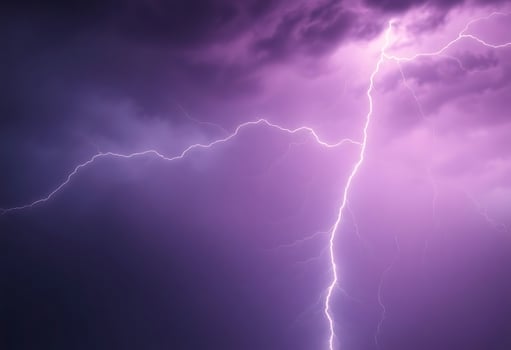 lightning bolt hitting the ground during a storm photo