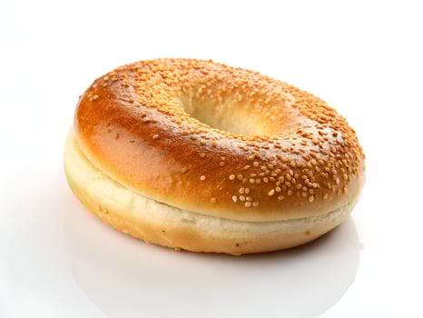 Sesame Seed Bagel Isolated on White Background, Ready to Eat photo