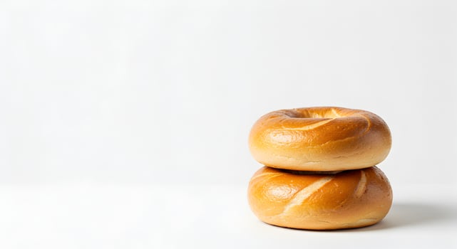Stack of Two Fresh Bagels on a White Background photo