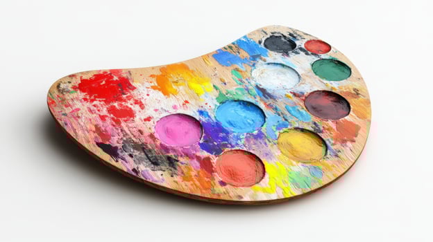 Used wooden paint palette with vibrant colorful pigments. photo