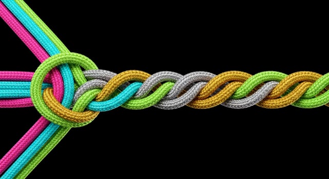 Colorful ropes braiding together symbolizing connection unity and strength photo