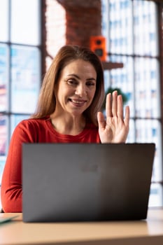 Female student trying to learn a new language from her home office, attending an online class lesson to develop her skills. Ambitious woman solving language learning exercises and tasks. photo