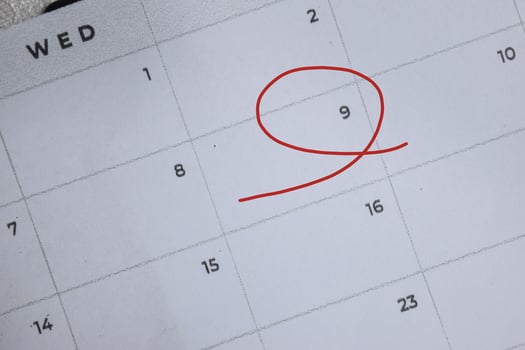 Focus on number 9 in calendar and emptyred ellipse. Save the date. Day of the year concept. photo