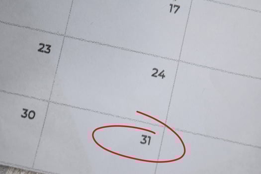 Focus on number 31 in calendar and emptyred ellipse. Save the date. Day of the year concept. photo