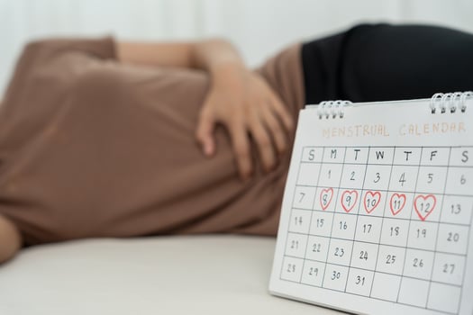 stomach ache. Asian woman have abdominal pain, indigestion, gastritis, menstrual cramps, flatulence, diarrhea, distention, colon cancer, belly inflammation problem, suffer food poisoning, abdomen photo