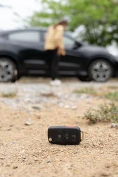 Lost car key on the ground, Car keys dropped on the floor or fall lying on the street home front. Walking Away From Lost Car Key, can not transport, express, rush time, wast time, emergency photo
