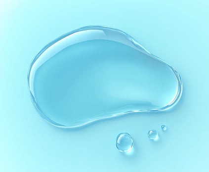 Blue drop of water on a blue background photo