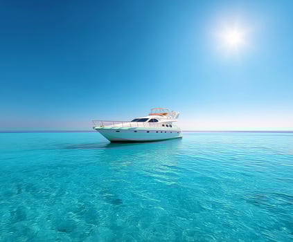 yacht in the middle of a clear water sea photo