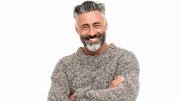 A man with a beard and sweater photo