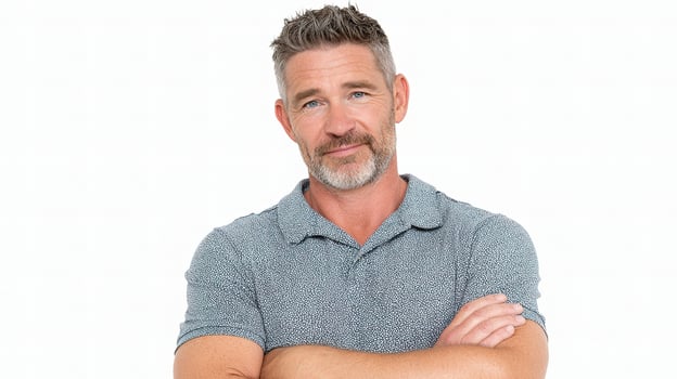 A man with his arms crossed and a smile photo