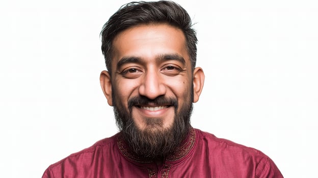 A man with a beard and a maroon shirt photo