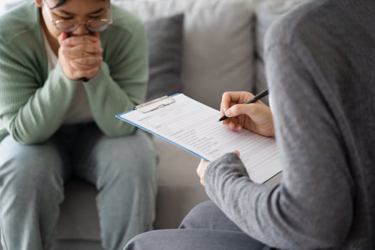 Psychologist doctor examine listen and talking to patient with depression, anxiety photo
