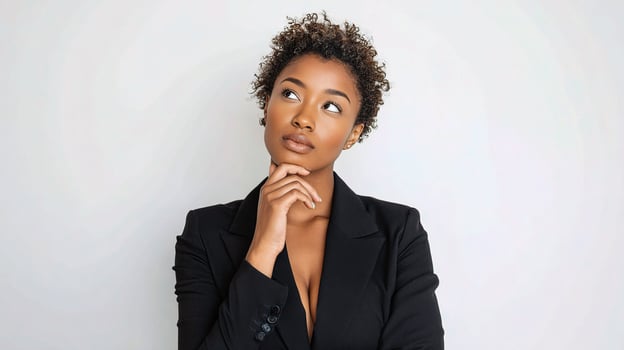 A woman in a suit and black shirt photo