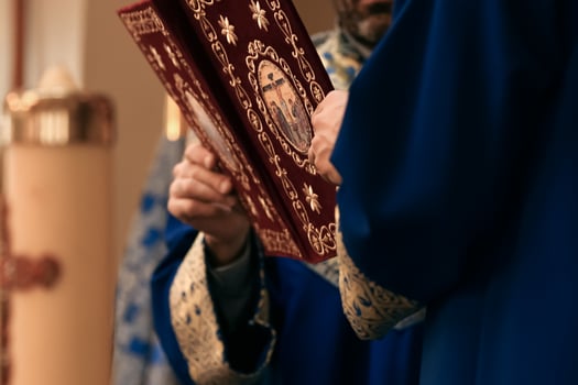Armenian priest with a bible. The Apostolic Church. photo