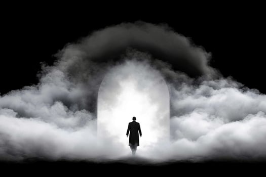 A man standing in front of an open door in the clouds photo