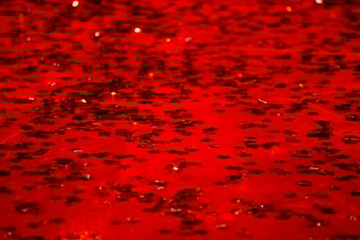Red festive background with sparkles. photo