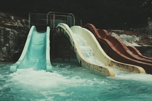 A water slide in a park photo