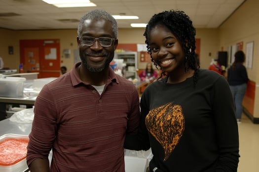 A man and woman standing in a kitchen photo