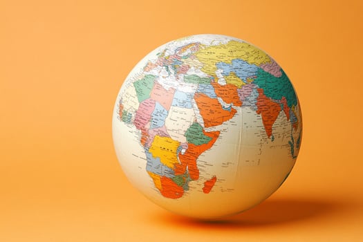 A globe on an orange background photo