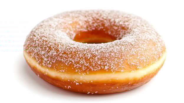 A donut with powdered sugar on top photo