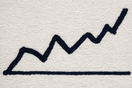 A black zigzag line rises sharply on a light background, representing increasing values over a period. This visual signifies growth and positive progress, capturing business success. photo