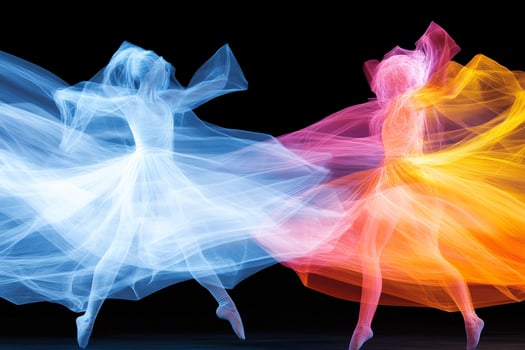 Two dancers are dancing in the air with colorful smoke photo