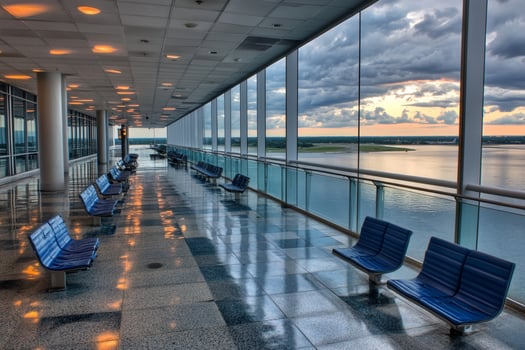 A long hallway with benches photo