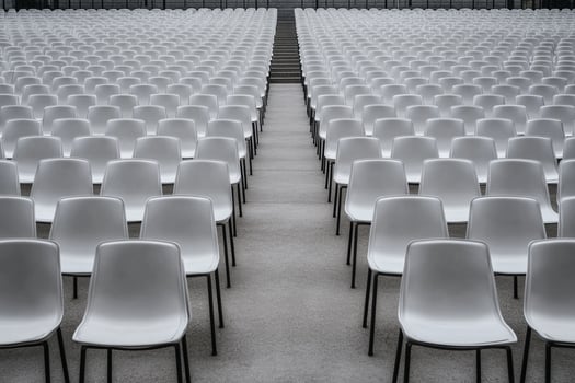 Empty chairs in a large auditorium photo