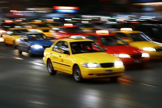 A yellow taxi cab photo