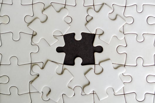 Top view of missing jigsaw. Customizable empty space on jigsaw for text photo