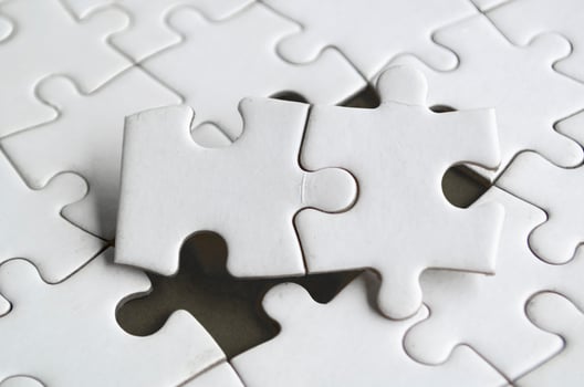 Connection of two puzzle parts in perfect harmony demonstrating logic clarity and teamwork in design photo