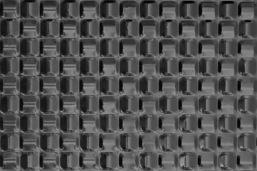 background of a brown metal door with a pattern photo