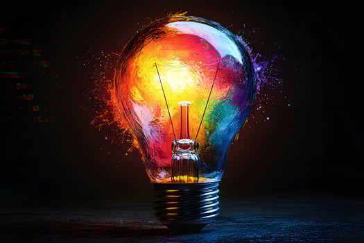 Creative Explosion Concept with Vibrant Colors Inside a Light Bulb for Imaginative Design photo