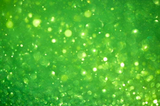 christmas green background with defocus bokeh photo