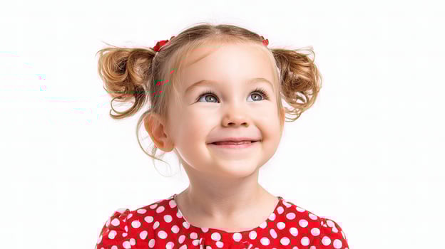 A little girl in a red polka dot dress photo