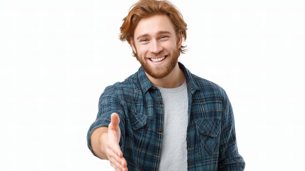 A man is smiling and holding out his hand photo
