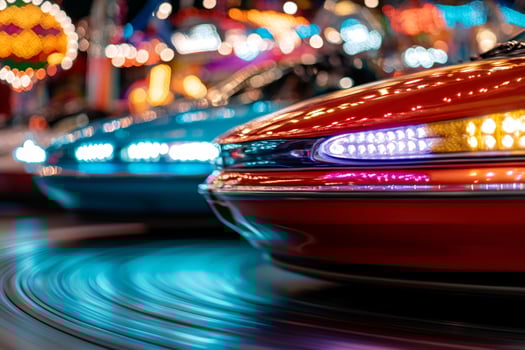 A car is driving on a carousel at night photo