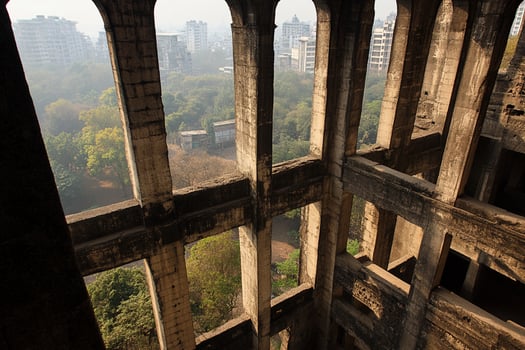 A view of a city from a window in a building photo