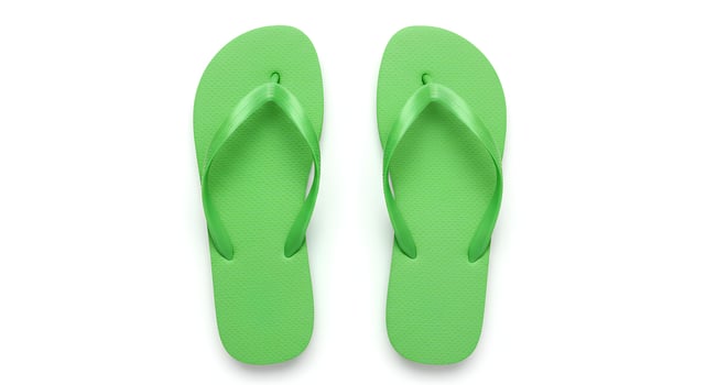 t lay of stylish flip flops on white background perfect for poolside marketing seaside getaway visuals and warm-weather fashion graphics photo