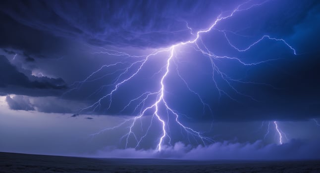 A lightning bolt strikes through the sky photo