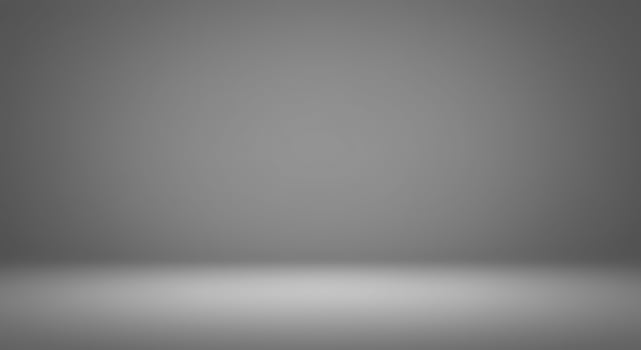 Empty gray room with a light bulb in the middle photo