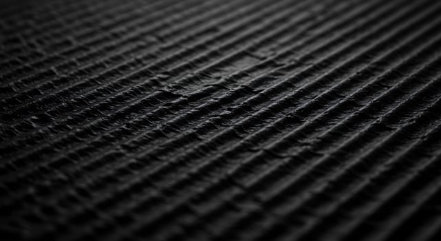 Black and white photo of a textured surface