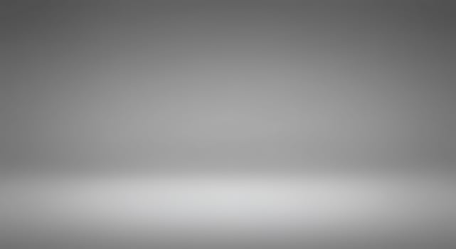 A gray background with a white light photo