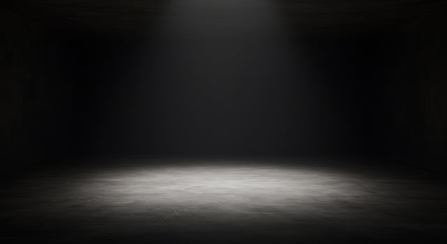 Dark room with light coming from the ceiling photo