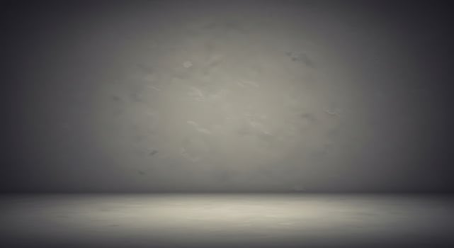 Empty room with gray walls and floor photo