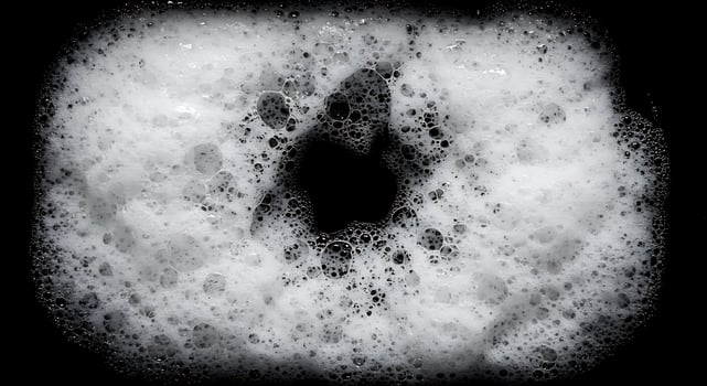 A close up of a soap bubble on a black background photo